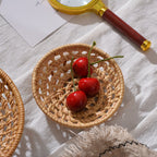Small round openwork rattan bowls on a table