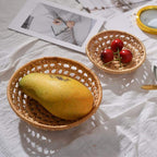 Small round openwork rattan bowls on a table