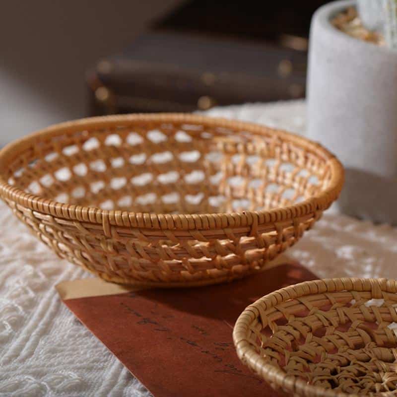 Small round openwork rattan bowls on a table