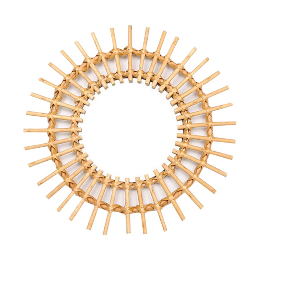 A Small Handmade Rattan Sun Mirror