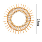 Small round rattan sun mirror
