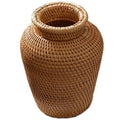 Small handwoven rattan urn shaped vase