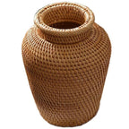 Small handwoven rattan urn shaped vase