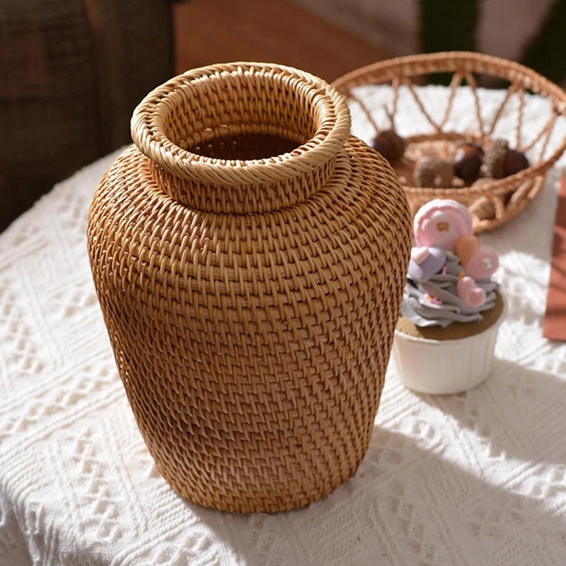 Small handwoven rattan urn shaped vase
