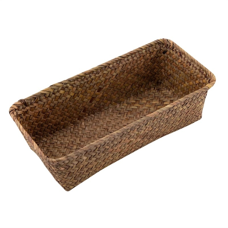 Small narrow rectangular woven baskets holding napkins and jars