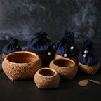 Small round hand woven rattan box with openwork sides