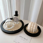 Small round handwoven rattan tray with raised rim