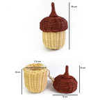 Small rounded hand woven rattan crossbody bag with an adjustable strap
