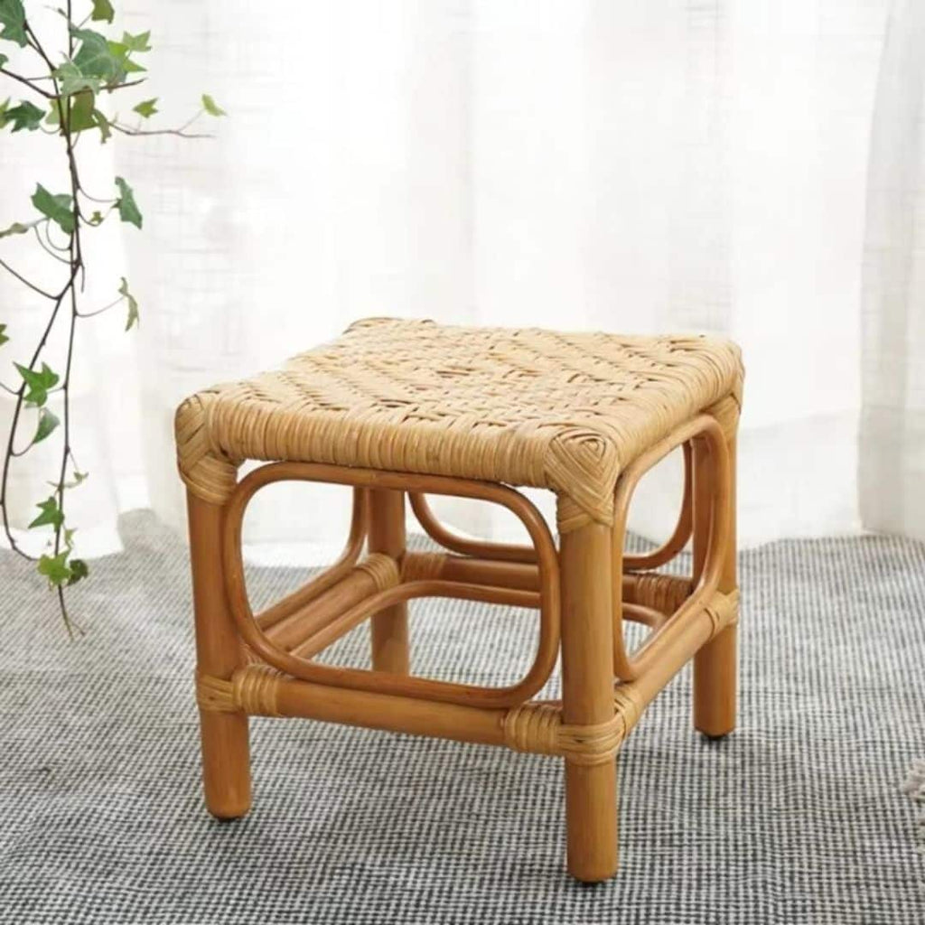 Small square hand woven wicker stool in a Scandinavian style