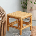 Small square hand woven wicker stool in a Scandinavian style