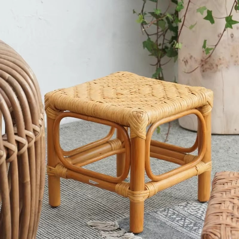 Small square hand woven wicker stool in a Scandinavian style