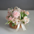 Small woven basket with white satin bow and wrapped handle