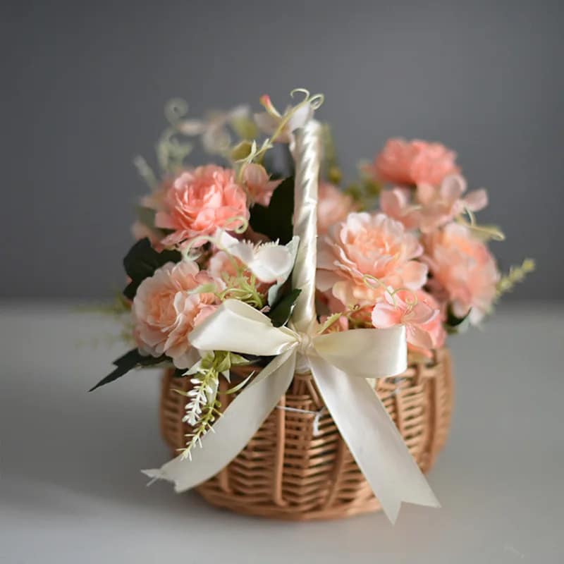 Small woven basket with white satin bow and wrapped handle