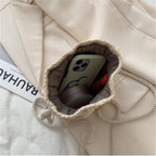 Small woven crossbody bag with an adjustable strap in beige or brown