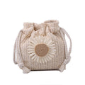 Small woven crossbody bag with an adjustable strap in beige or brown