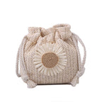 Small woven crossbody bag with an adjustable strap in beige or brown
