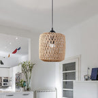 Small woven rattan cylinder pendant in a bright kitchen