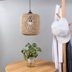 Small woven rattan cylinder pendant in a bright kitchen