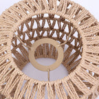 Small woven rattan cylinder pendant in a bright kitchen