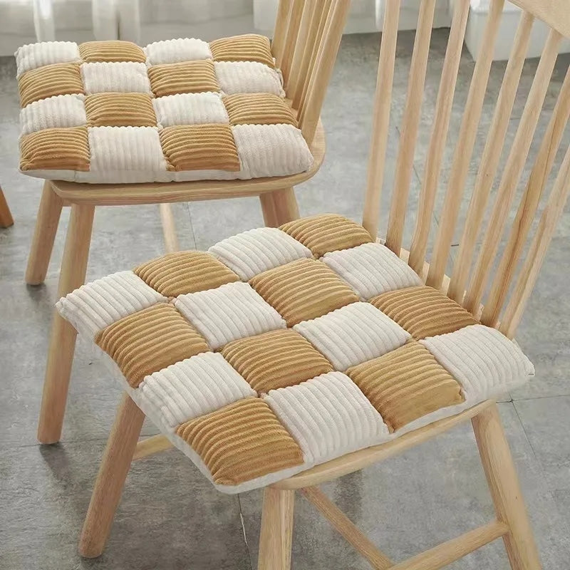Square chair cushion with an off white and warm brown check pattern