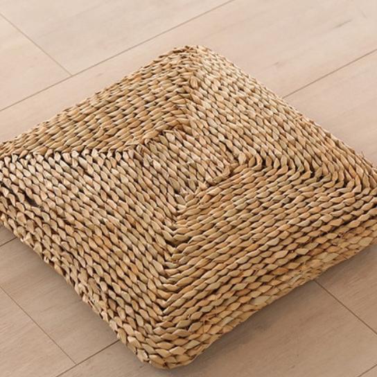 Square cushion tightly hand woven in dark rattan