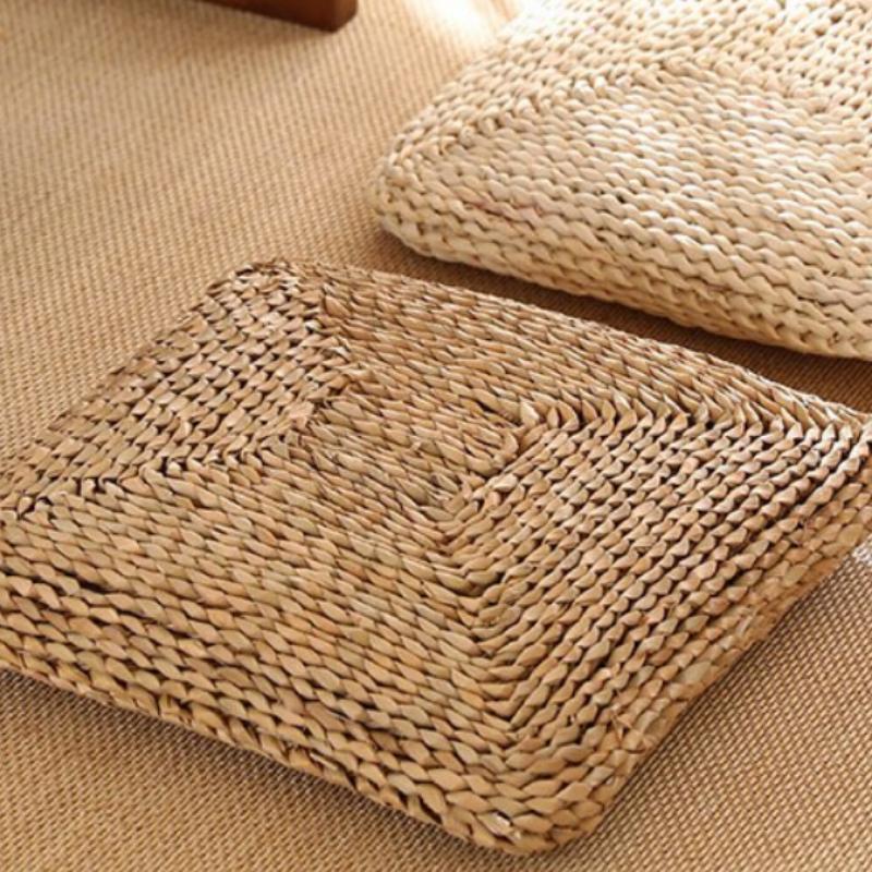 Square cushion tightly hand woven in dark rattan