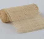 Roll of natural rattan cane webbing with a square open mesh