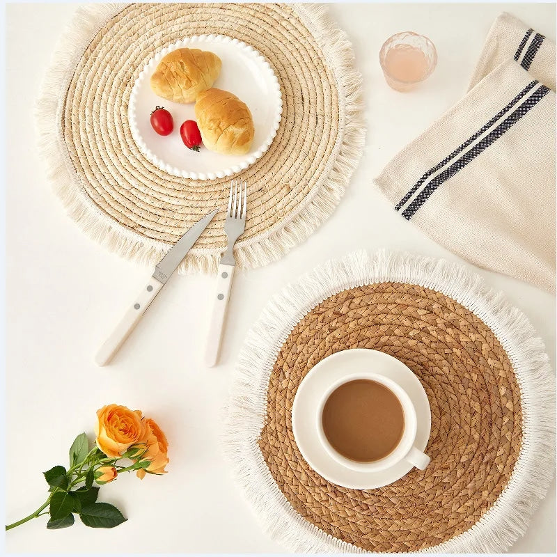 Square hand woven rattan placemat with fine threads woven along the edge