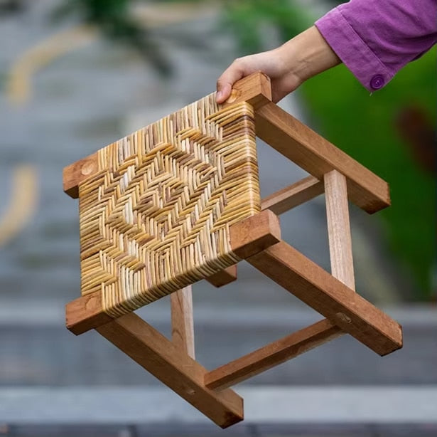 Square hand woven wicker stool on a solid wood frame