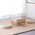 Square hand woven wicker coffee table with a lift up top and storage inside