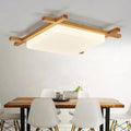 Square brown wood pendant light with clean lines