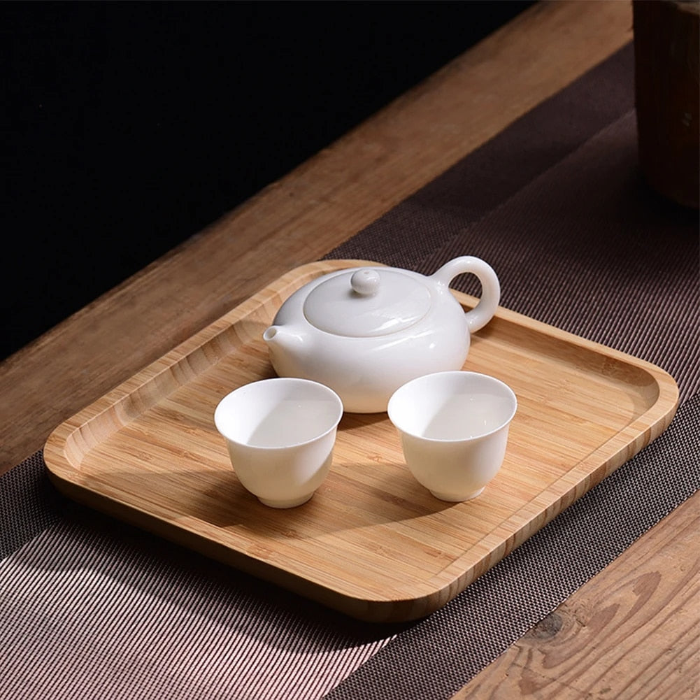 Square handwoven bamboo platter with raised edges