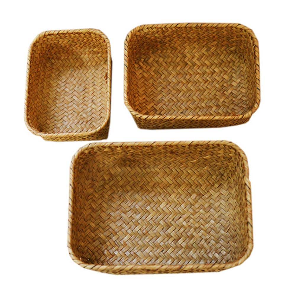 Square woven basket holding dried flowers