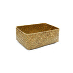 Square woven basket holding dried flowers