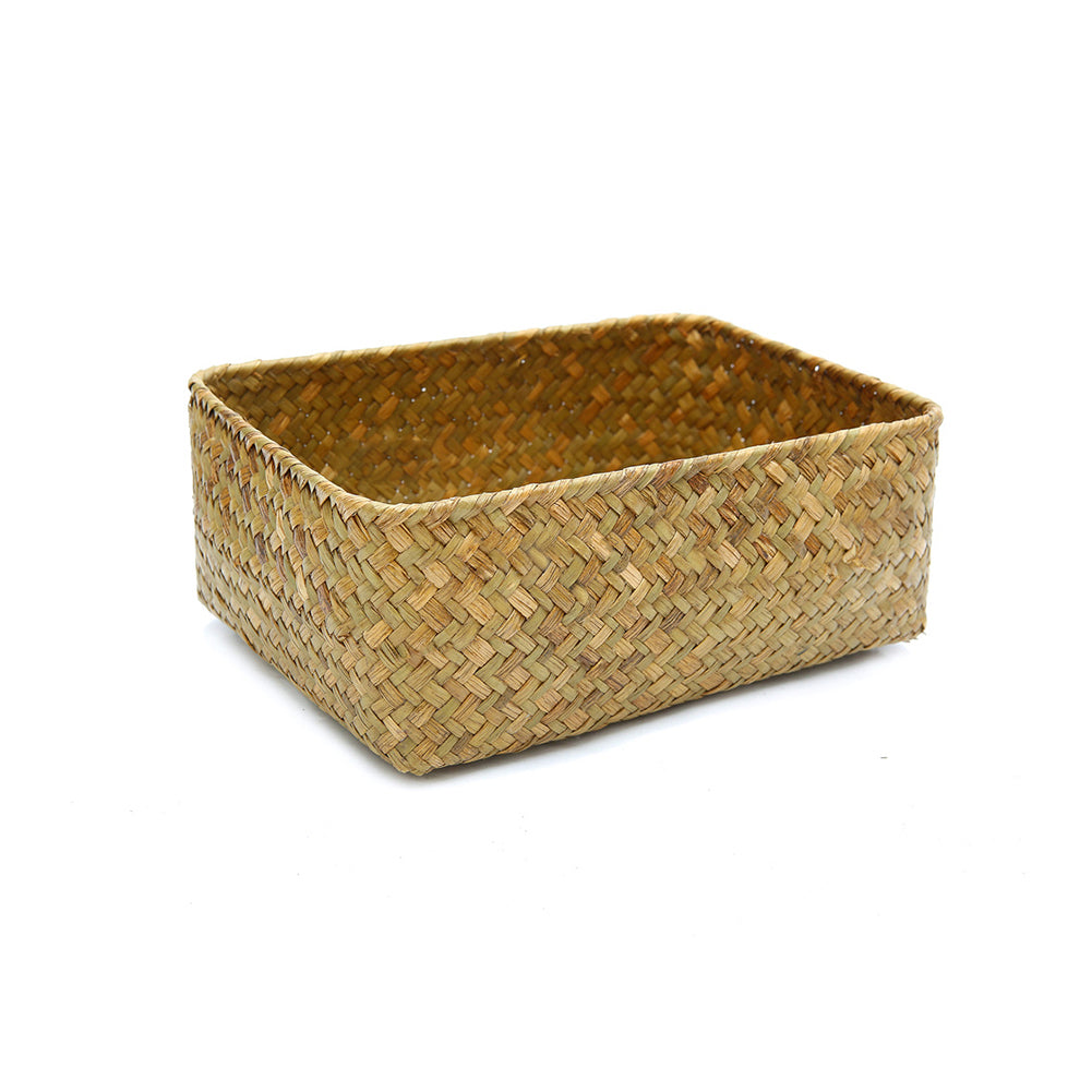 Square woven basket holding dried flowers