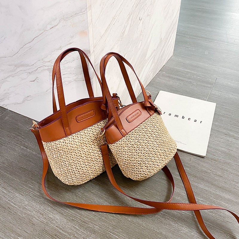 Hand woven straw handbag with smooth faux leather edging and strap