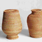 Round handwoven rattan vase with fine accent stripes