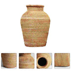 Round handwoven rattan vase with fine accent stripes