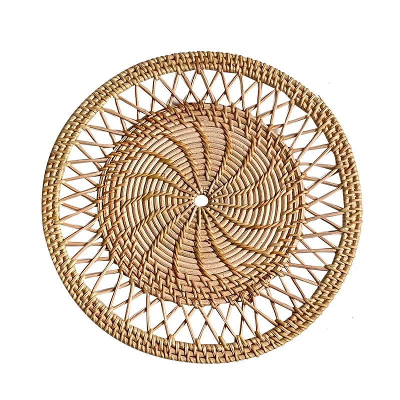 Round woven bamboo placemat with rays radiating from the center like a sun