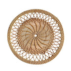 Round woven bamboo placemat with rays radiating from the center like a sun