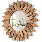 Round mirror surrounded by carved wooden sunflower petals