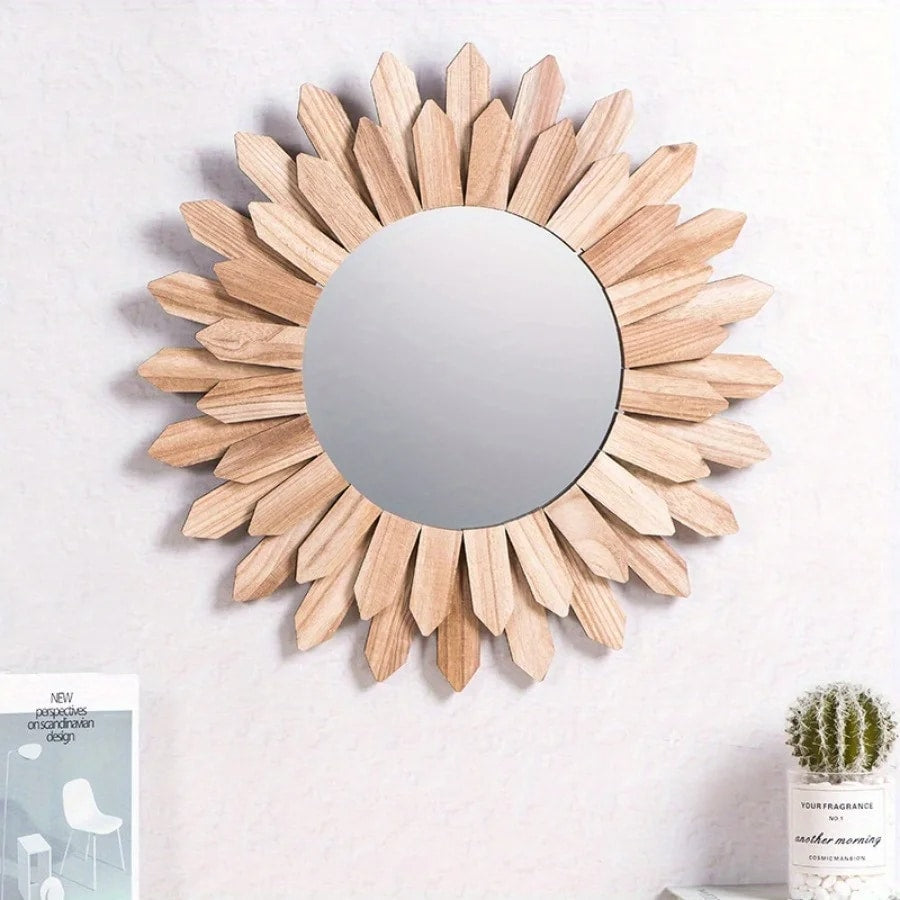 Round mirror surrounded by carved wooden sunflower petals