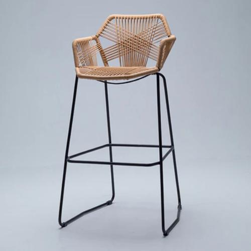 Bar chair with a hand woven beige synthetic rattan seat and hexagon back on black legs