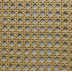 Roll of woven synthetic rattan webbing in beige or brown