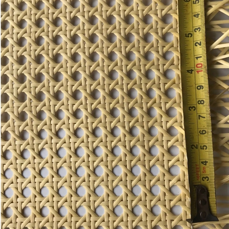 Roll of woven synthetic rattan webbing in beige or brown