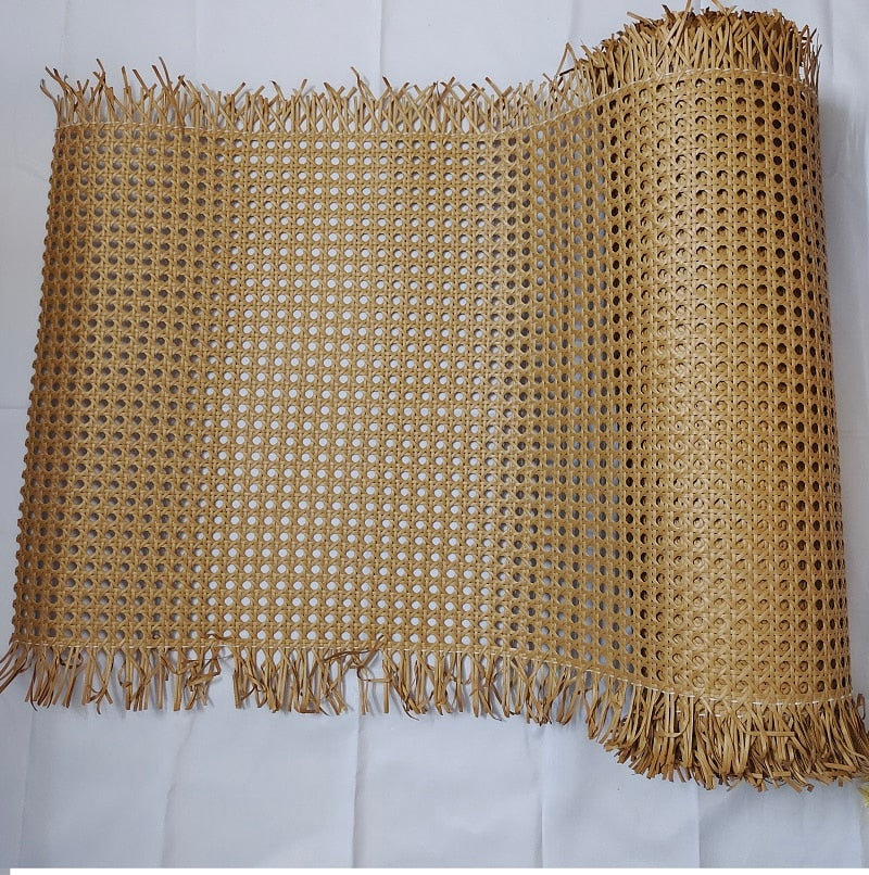 Roll of woven synthetic rattan webbing in beige or brown