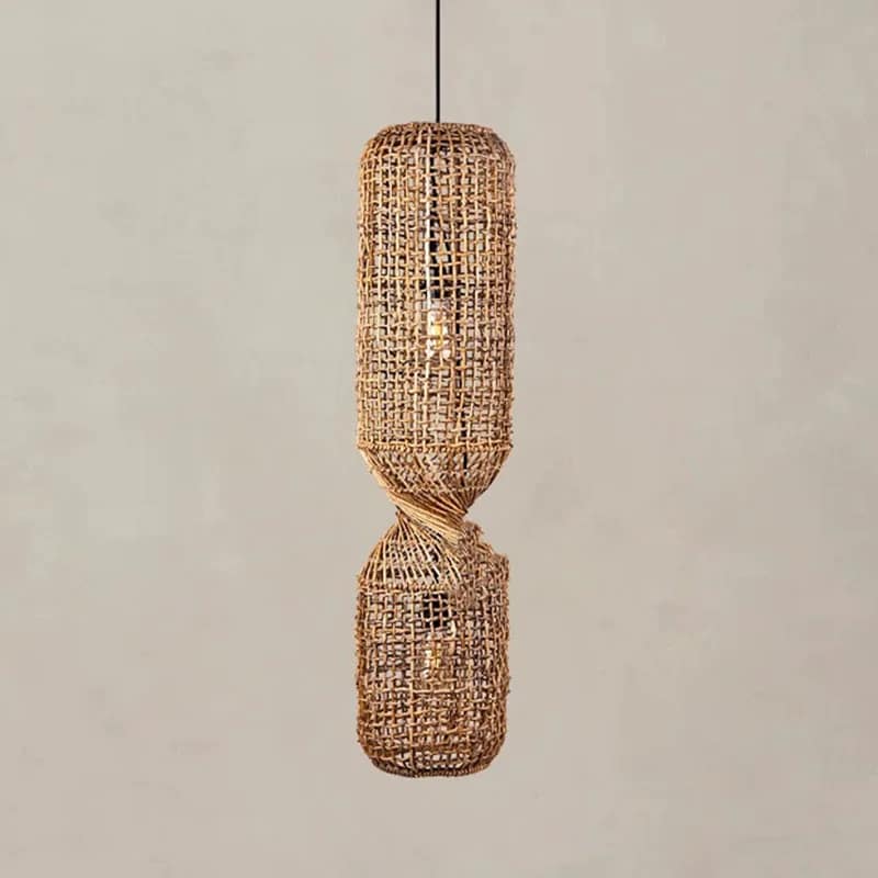 Tall pendant light made of two stacked woven rattan cylinders