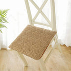 Round thick plush chair cushion with a woven look pattern like rattan