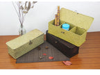 Long woven rattan and wicker box with three compartments and a lid