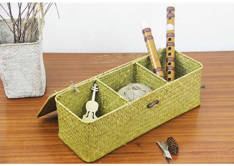 Long woven rattan and wicker box with three compartments and a lid
